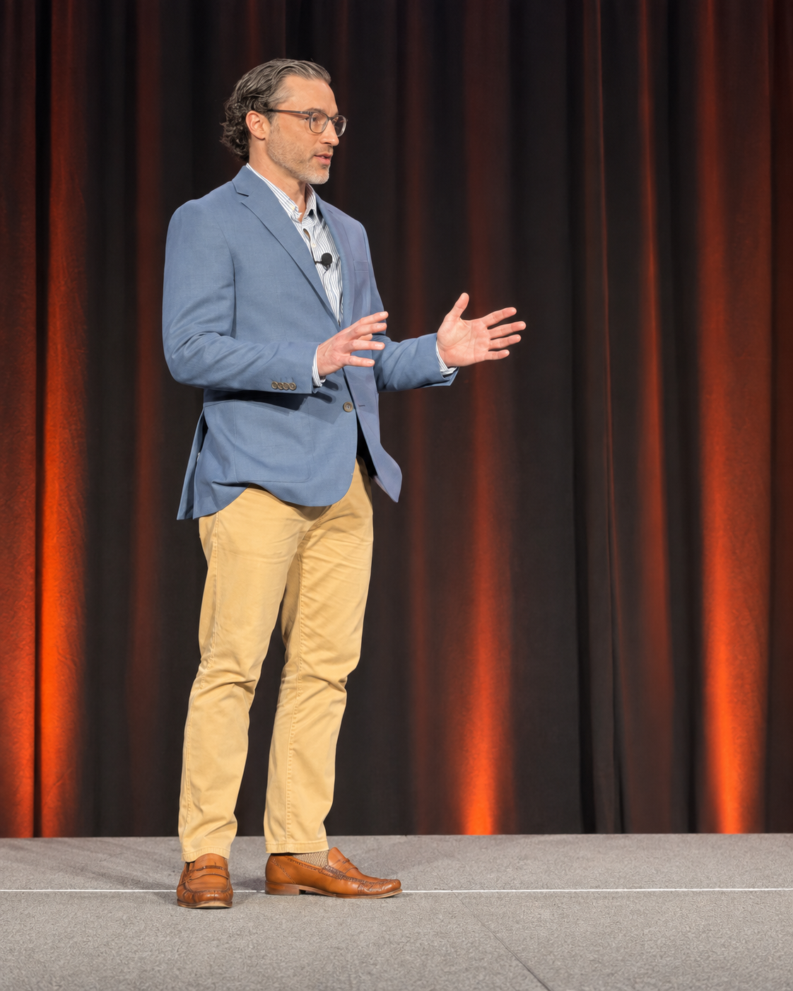 Ben Davis speaking on stage
